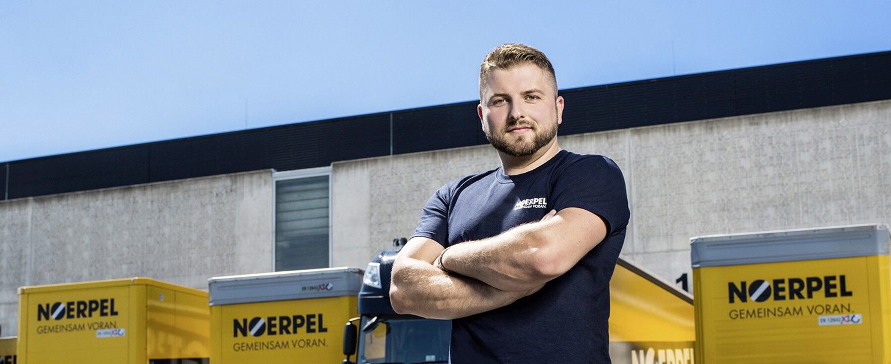 Mitarbeiter vor Noerpel LKW